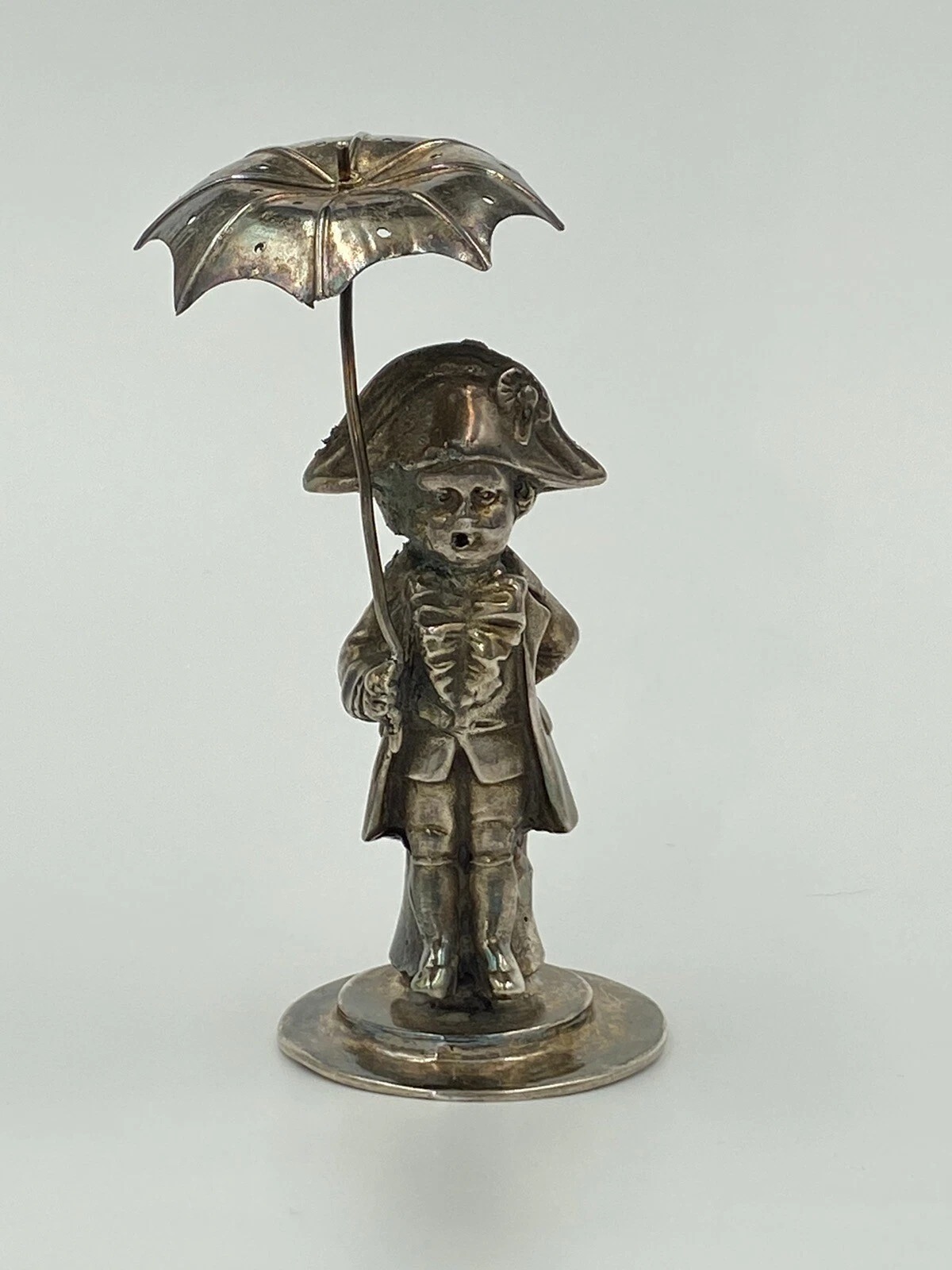 Napoleon with umbrella figural toothpick holder unmarked. authentic. Seen a few.